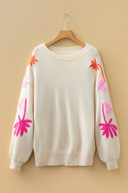 Suéter suelto de cuello redondo con manga floral bordada color beige