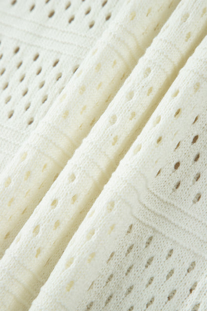 Suéter dolman blanco de manga corta con ojales calados y ribete acanalado, talla grande