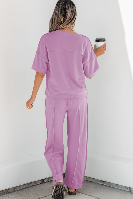 Conjunto de camiseta holgada de hombros caídos y pantalones tipo barril con estampado de orquídeas