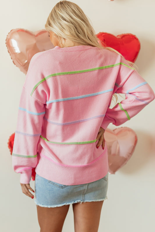 Suéter Henley holgado con rayas arcoíris rosas y hombros caídos
