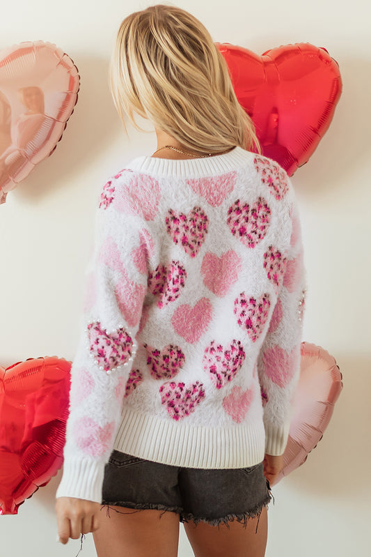 Suéter borroso con ribete acanalado, estampado de leopardo y corazón rosa con perlas