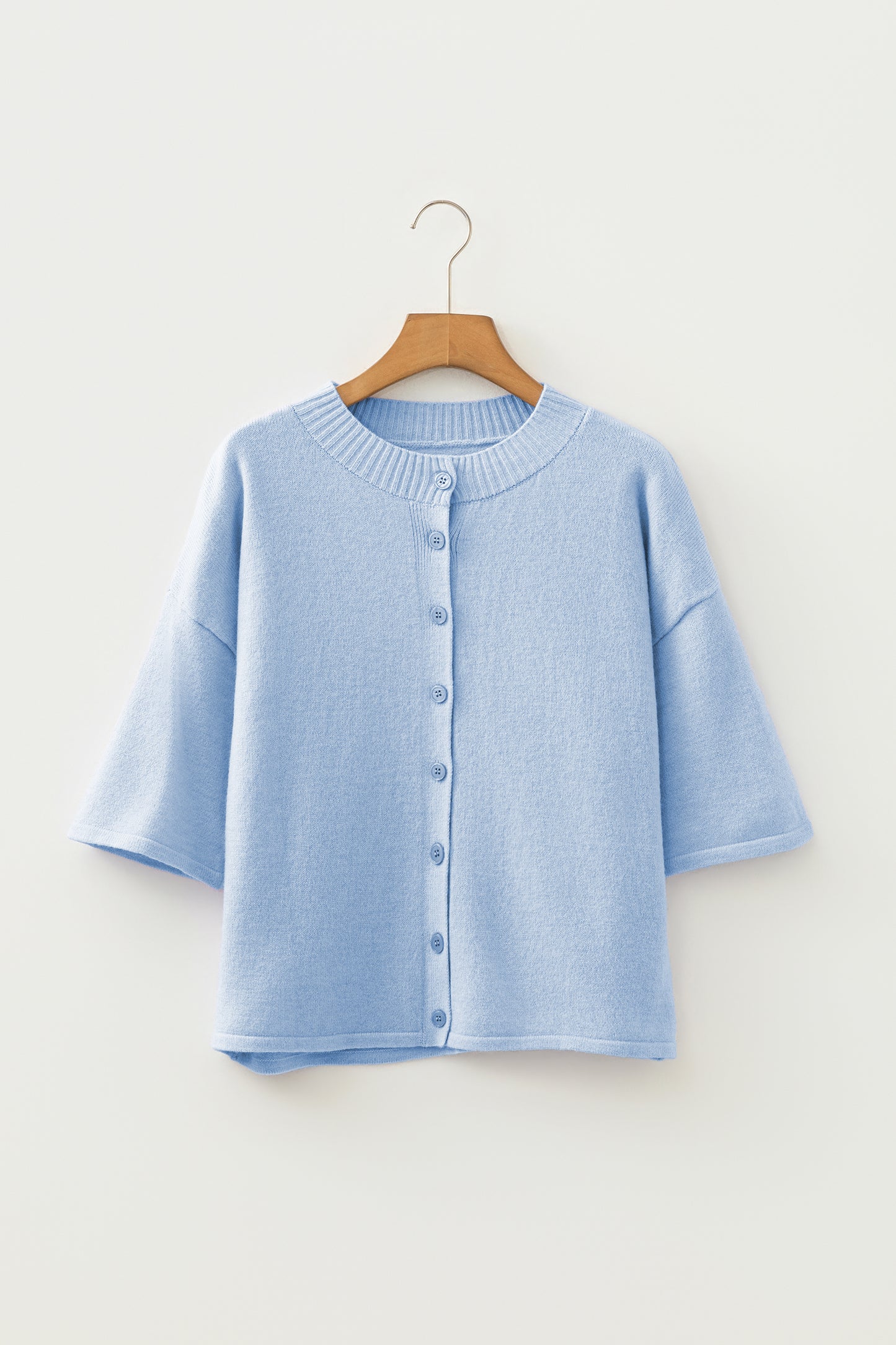 Cárdigan de punto holgado con cuello abotonado y manga 3/4 en azul Beau