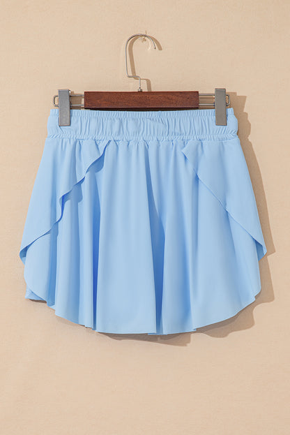 Faldas pantalón de tenis forradas, azul cielo, con cintura elástica con cordón