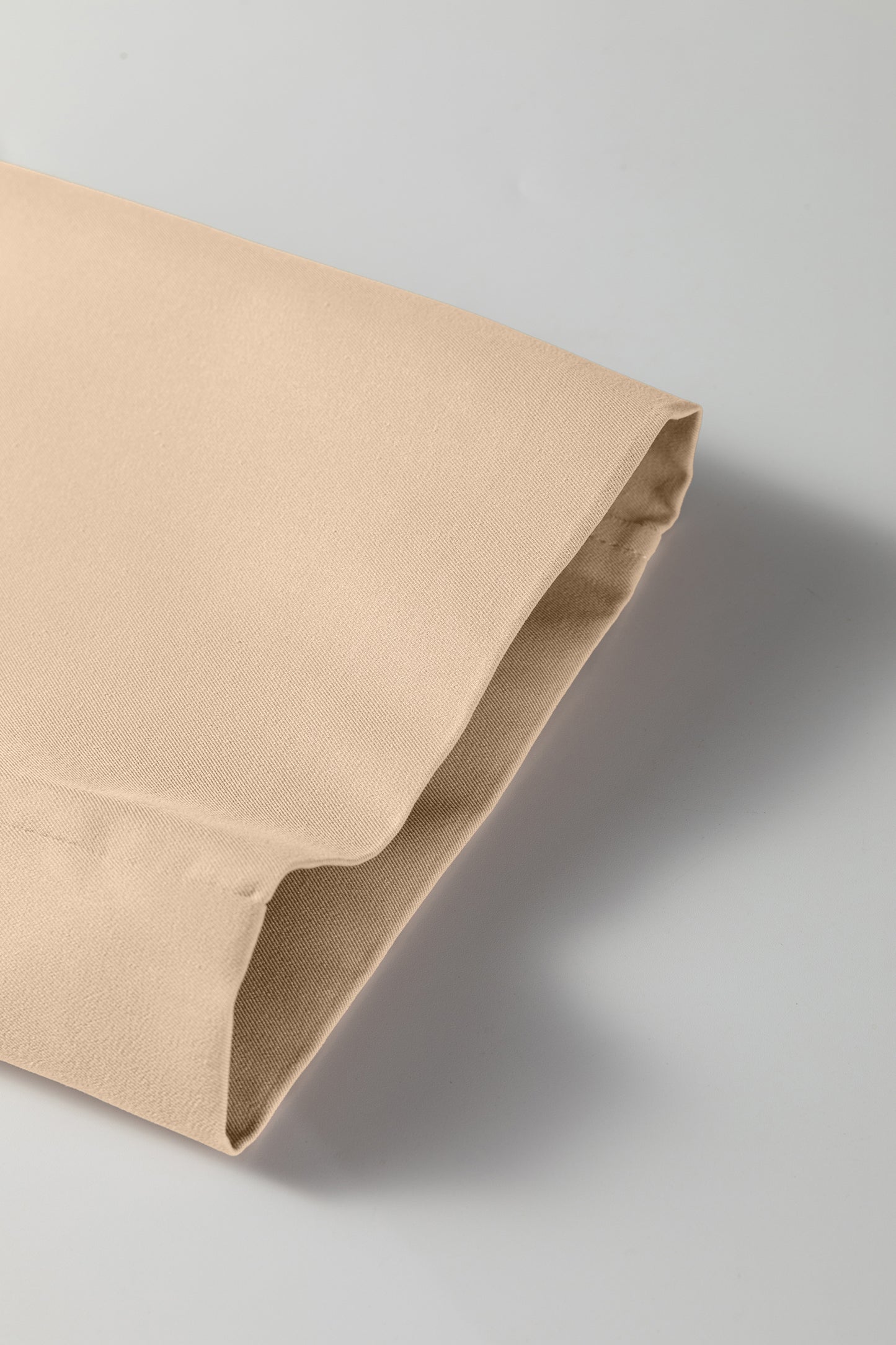 Gabardina cruzada de patchwork con forro a cuadros en pergamino