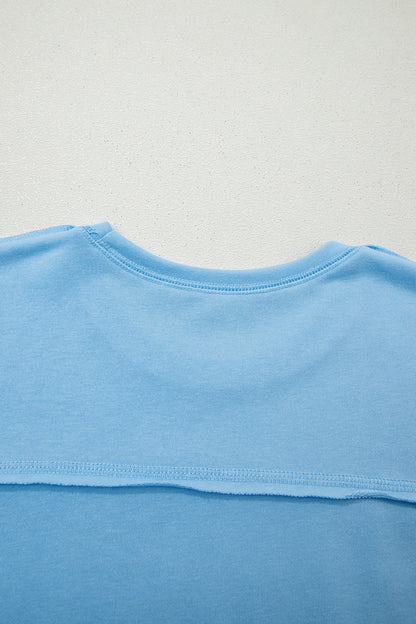 Conjunto de camiseta holgada con hombros caídos y pantalones tipo barril en azul cielo