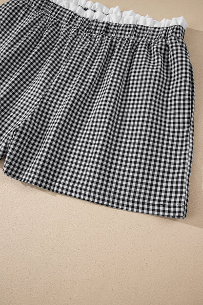 Pantalones cortos de talla grande con estampado de cuadros y ribete en contraste negro