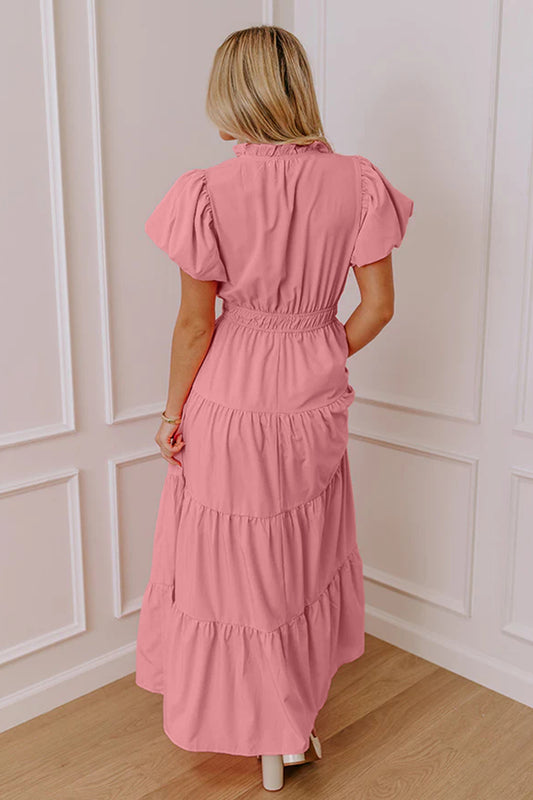 Vestido largo maxi rosa pálido de color liso, escote en V, manga corta abullonada y cintura alta con volantes.