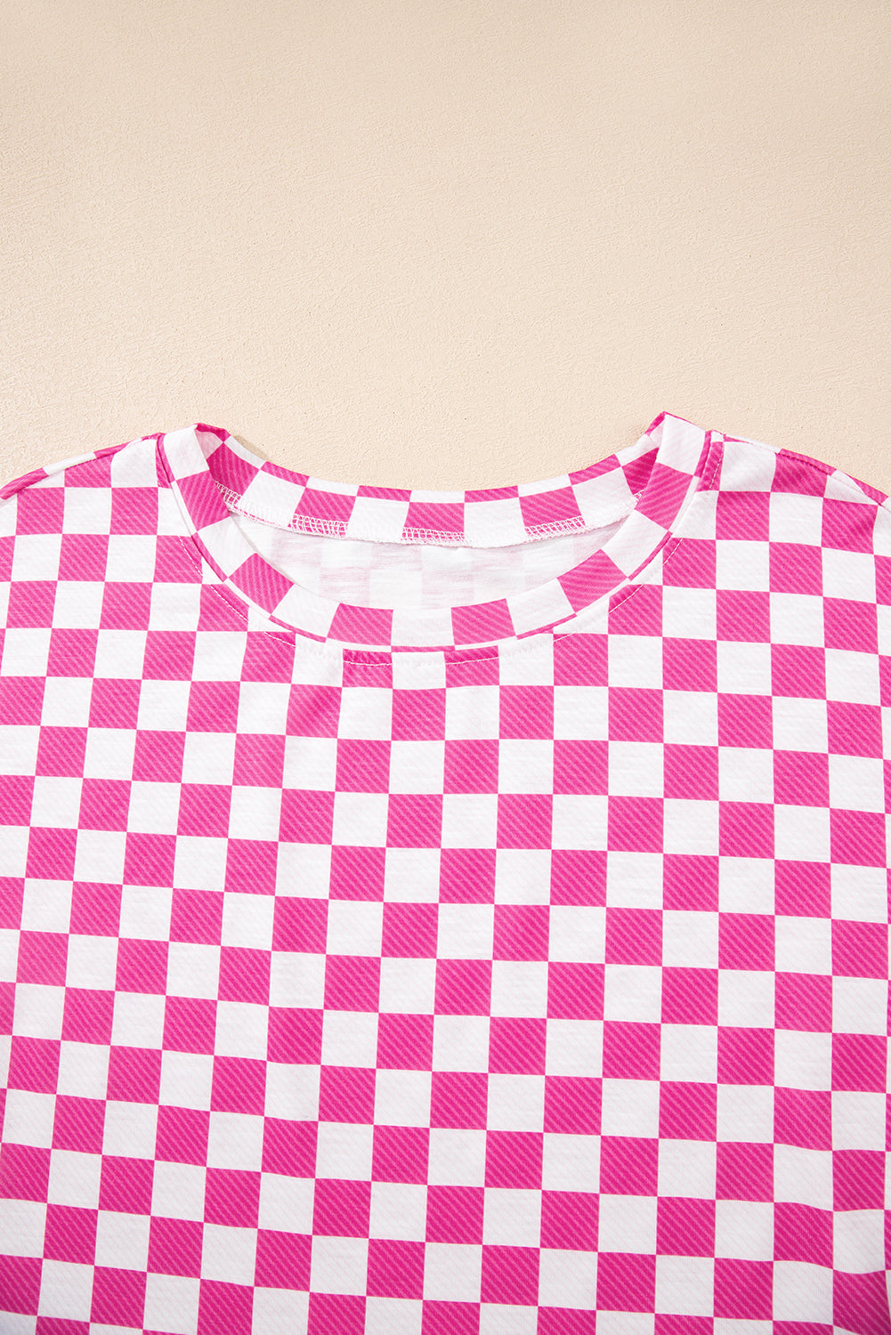 Conjunto de dos piezas de camiseta a cuadros rosa y skort de tiro alto