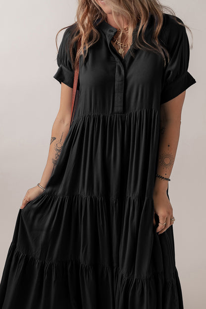 Vestido largo acampanado con volantes escalonados, manga corta y botones ocultos negros