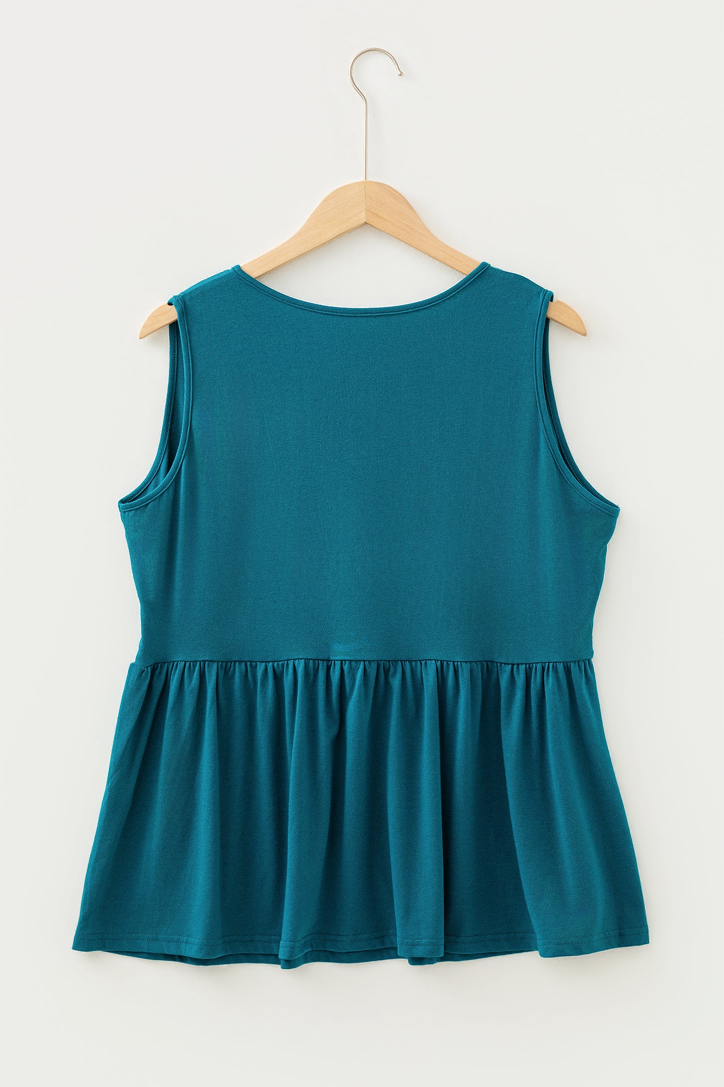 Top sin mangas peplum con lazo liso talla grande azul zafiro