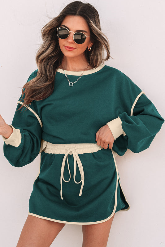 Conjunto de jersey suelto con contraste de color perenne y minifalda pantalón con cordones en la cintura