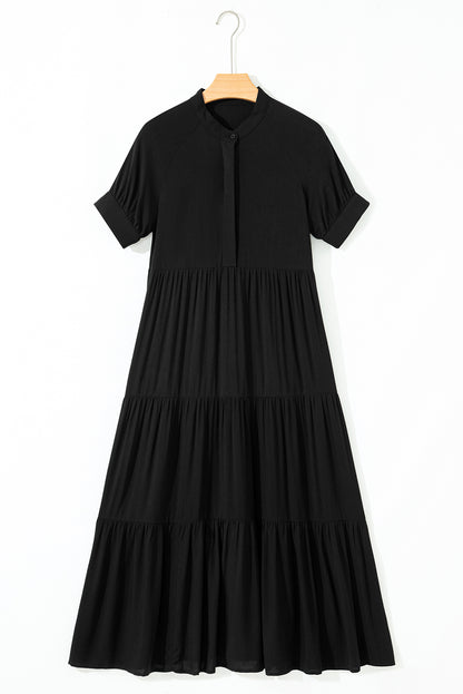 Vestido largo acampanado con volantes escalonados, manga corta y botones ocultos negros