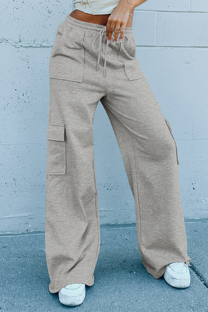 Pantalones de entrenamiento de pierna ancha, cintura alta con cordones y múltiples bolsillos, gris claro