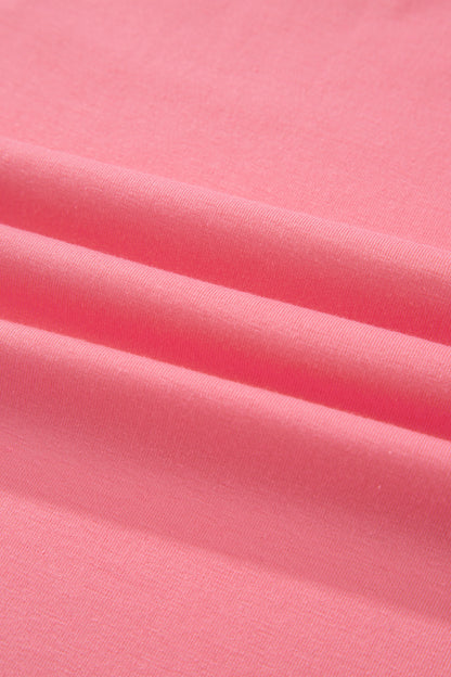 Camiseta talla grande color melocotón sólido con costura sin rematar y bajo con volantes