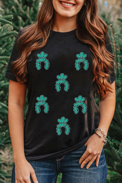 Camiseta negra con lentejuelas y parches, diseño turquesa del Oeste
