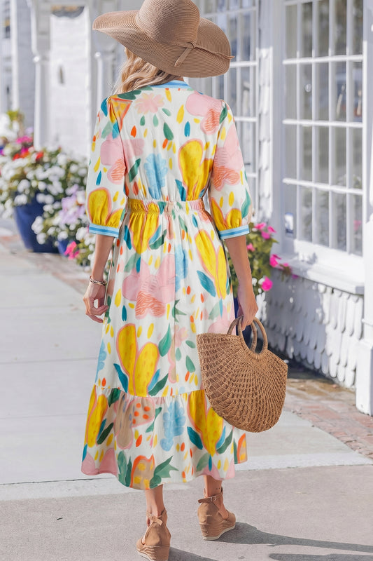Vestido midi con cuello en V, estampado floral multicolor tipo garabato y ribete a rayas