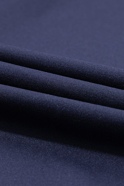 Pantalones deportivos azul marino con cordón ajustable en la cintura elástica y bolsillos