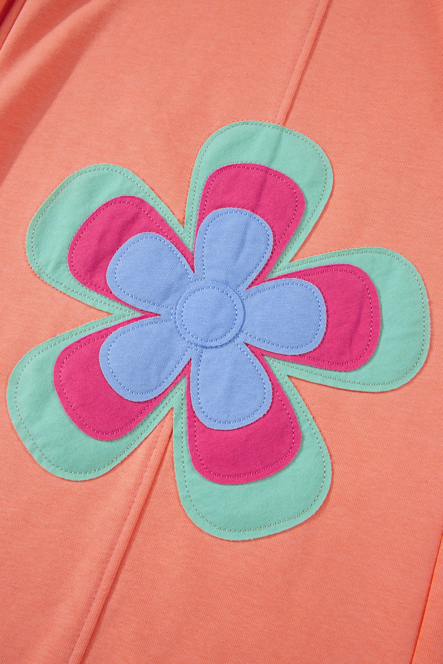 Pantalón de pierna ancha con cordón y cintura elástica contrastada, estampado floral en bloques de color naranja y pomelo