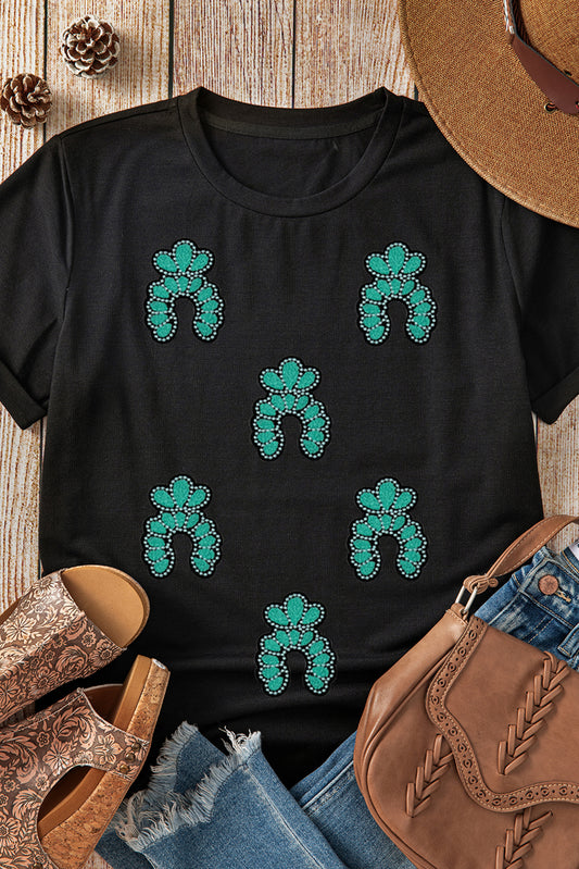 Camiseta negra con lentejuelas y parches, diseño turquesa del Oeste