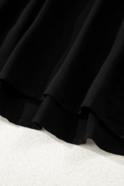 Vestido largo acampanado con volantes escalonados, manga corta y botones ocultos negros