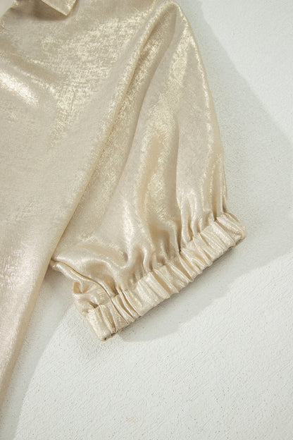 Top metálico beige de cuello y escote en V con media manga