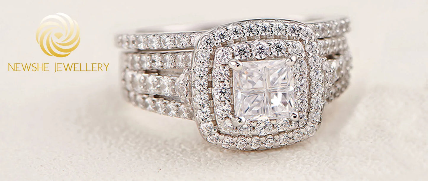 Newshe Lujoso Juego de Anillos de Boda con Halo de Plata Esterlina 925 para Mujeres Elegante Joyería Anillos de Diamante de Princesa Simulados