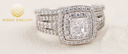 Newshe Lujoso Juego de Anillos de Boda con Halo de Plata Esterlina 925 para Mujeres Elegante Joyería Anillos de Diamante de Princesa Simulados