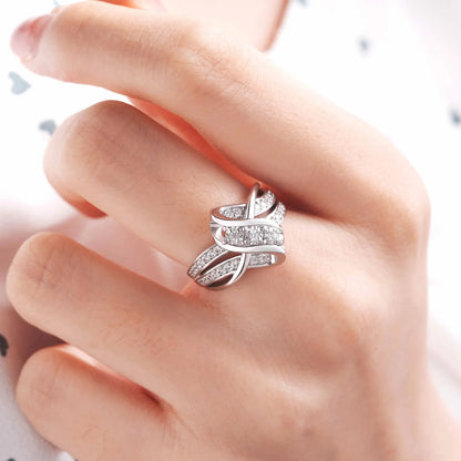 Newshe Anillos de compromiso de plata 925 para mujer, diseño de nudo único, circonita cúbica brillante AAAAA, anillo llamativo
