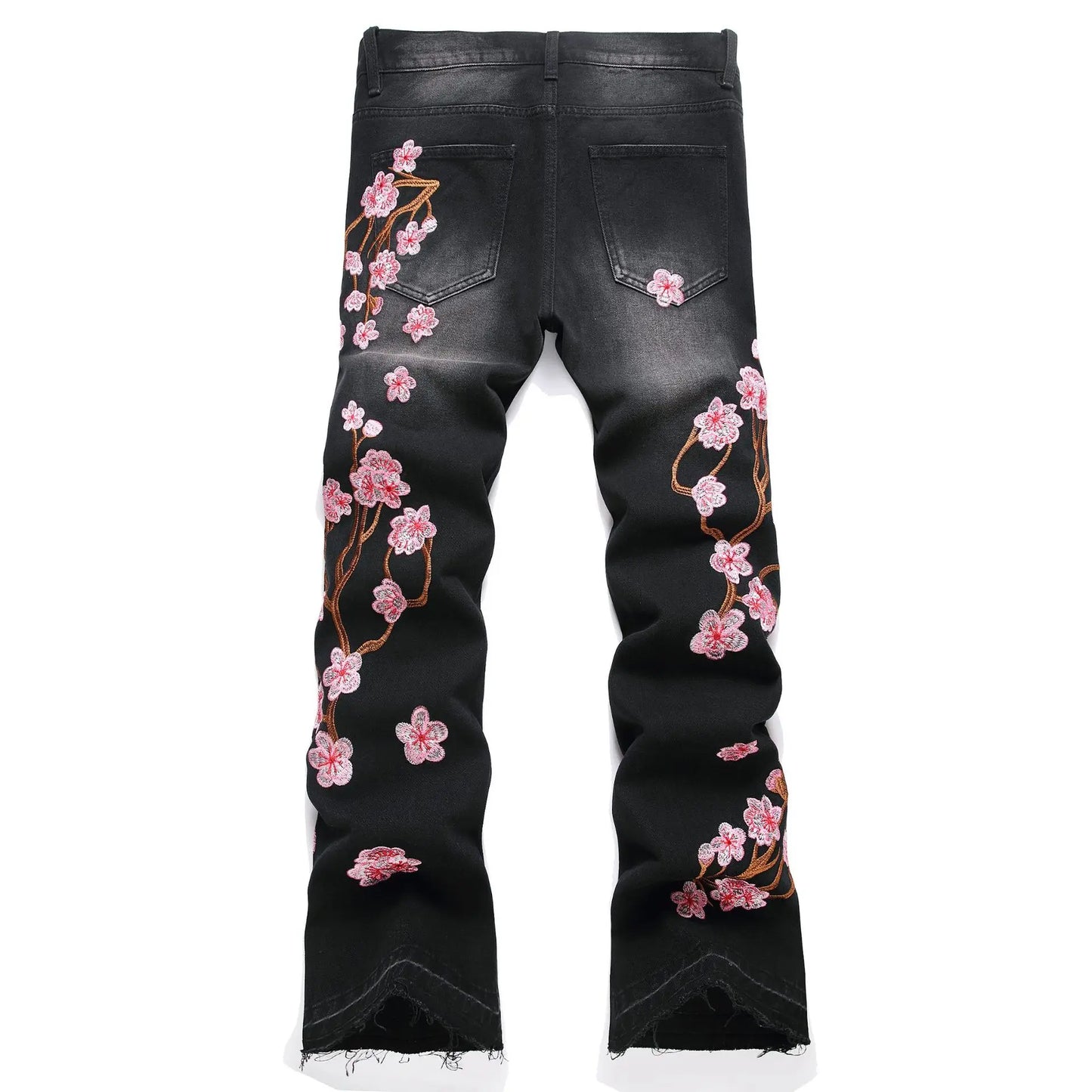 Vaqueros rotos de hombre de moda con parches de bordado floral, vaqueros acampanados desgastados de estilo urbano de tendencia