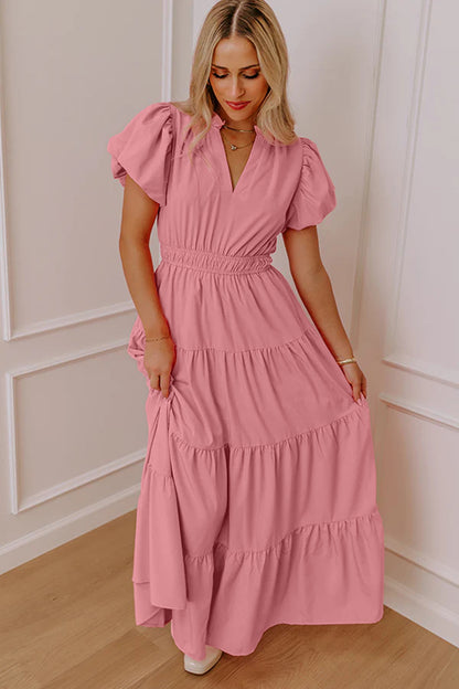 Vestido largo maxi rosa pálido de color liso, escote en V, manga corta abullonada y cintura alta con volantes.