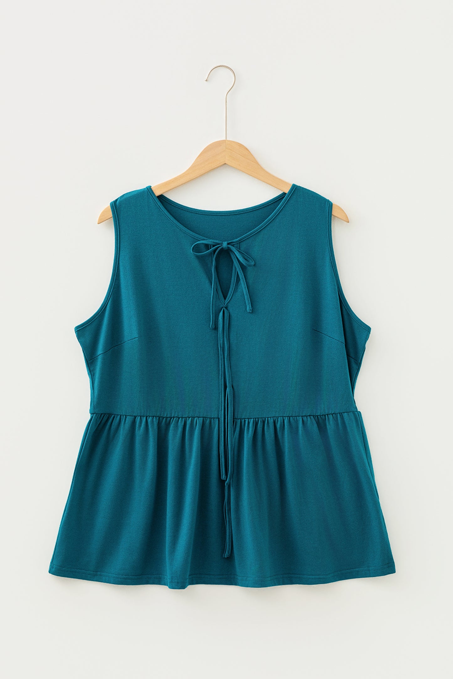 Top sin mangas peplum con lazo liso talla grande azul zafiro