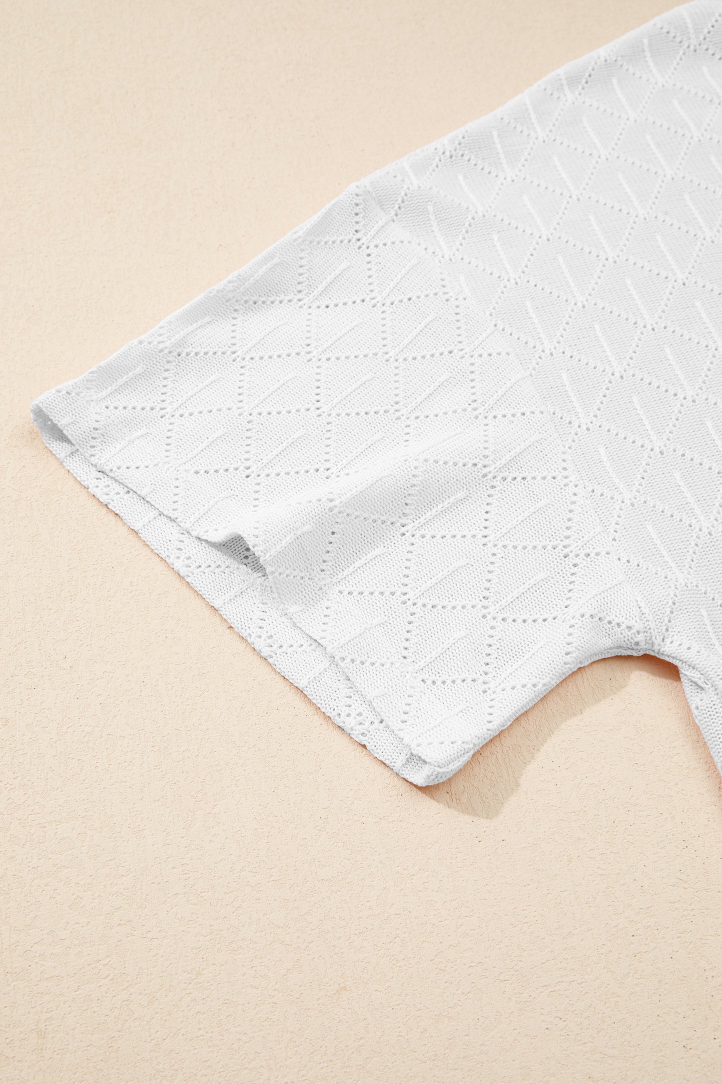 Top suelto de punto calado blanco con escote de pico y rombos, talla grande
