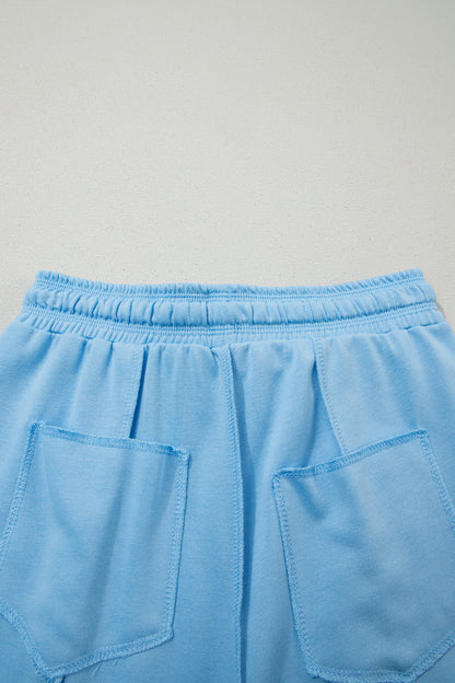 Conjunto de camiseta holgada con hombros caídos y pantalones tipo barril en azul cielo