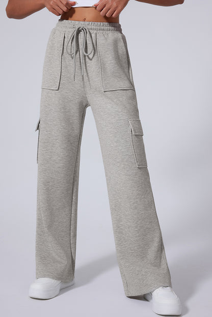 Pantalones de entrenamiento de pierna ancha, cintura alta con cordones y múltiples bolsillos, gris claro