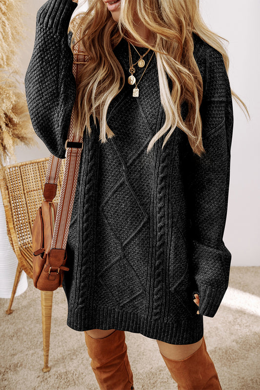 Vestido suéter suelto de punto trenzado negro con hombros caídos