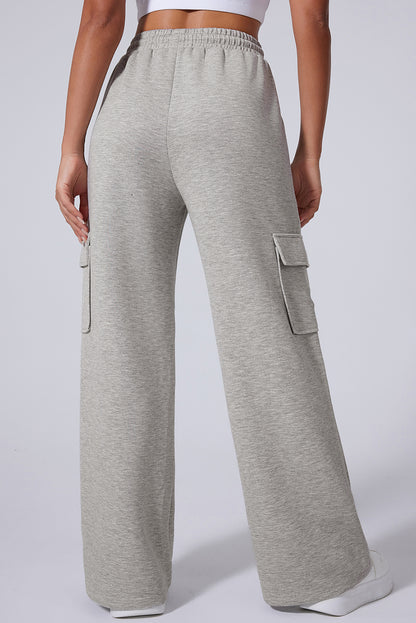 Pantalones de entrenamiento de pierna ancha, cintura alta con cordones y múltiples bolsillos, gris claro