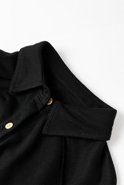 Chaqueta holgada de punto waffle negra con retazos y costuras expuestas