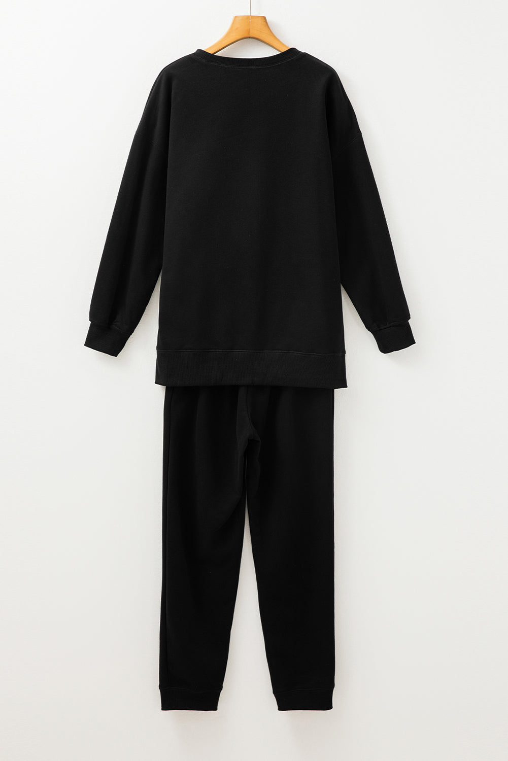 Black Solid Color High Low Pullover and Skinny Pants Set - Snoopy's Closet