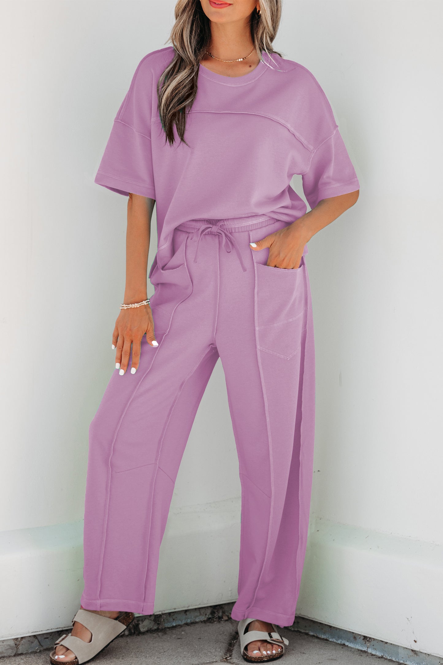 Conjunto de camiseta holgada de hombros caídos y pantalones tipo barril con estampado de orquídeas