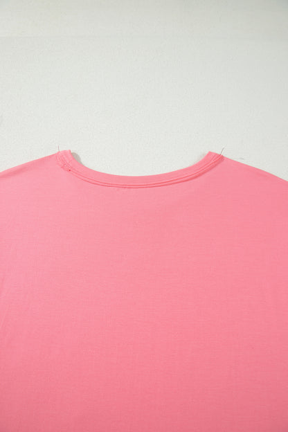 Camiseta talla grande color melocotón sólido con costura sin rematar y bajo con volantes