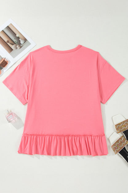 Camiseta talla grande color melocotón sólido con costura sin rematar y bajo con volantes
